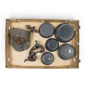 A collection of ebonised wooden trophy bases, together with a carved corbel and a mahogany