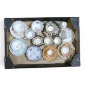 A collection of 18/19th century porcelain tea cups, coffee cups and saucers in various patterns from