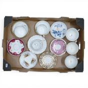 A collection of 18/19th century porcelain tea cups, coffee cups and saucers in various patterns from