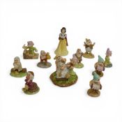 A large Collection of Royal Doulton Walt Disney figures including Grumpys Bath time Tableau, Snow