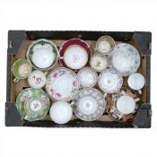 A collection of 18/19th century porcelain tea cups, coffee cups and saucers in various patterns from