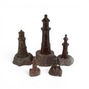 Cornish Serpentine stone lighthouse sculptures, carved from Serpentine stone with red tones with