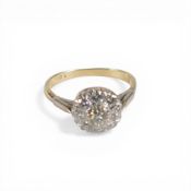 Yellow metal ring set with a cluster of diamonds, electronically tested to be 18ct gold, size L, 3.