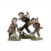 Royal Valvedere, Vienna Austria, porcelain figurines of a boy carrying a sack with a bird perched on