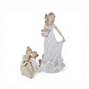 The Leonardo Collection figurines featuring a young girl holding a basket of flowers, and mother