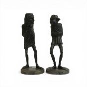 A pair of vintage metal candlestick statues representing comedy and tragedy. (H: 27cm) (2)