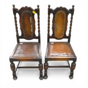 A pair of Jacobean style oak dining chairs, with barley twist columns on the back and legs,