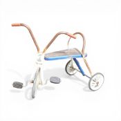A vintage children's Raleigh tricycle, with blue metal frame and rubber edged wheels.