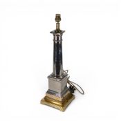 Modern table lamp in chrome and brass, overall height 53cm.
