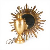 Vintage neoclassical style urn lamp with a gold gilt finish, together with gilded wood sunburst