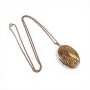 9ct oval locket and chain, 10.3g.