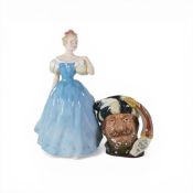 Royal Doulton lady figure, Enchantment HN2178 and character jug, The Trapper D6612. (H: 20cm) (2)