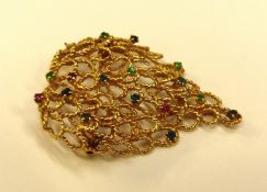 Intricate 14ct gold brooch set with gemstones (some stones absent), 10.2g.