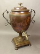 Copper Samivar, twin-handled raised on a stepped square base and bun supports, height 44cm.
