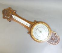 Early 20th century carved oak Aneroid barometer, Benn Franks Optician, Hull, Hanley & Co., with