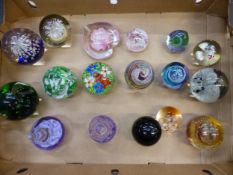 A collection of 17 art glass paperweights (1 tray).