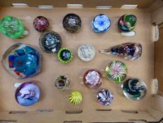A collection of 17 art glass paperweights (1 tray).