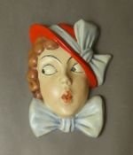 A Czechoslovakian Art Deco face mask, height 19cm.