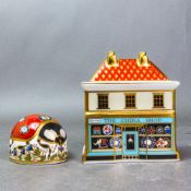 Royal Crown Derby The China Shop paperweight, porcelain stopper, together with a small Ladybird