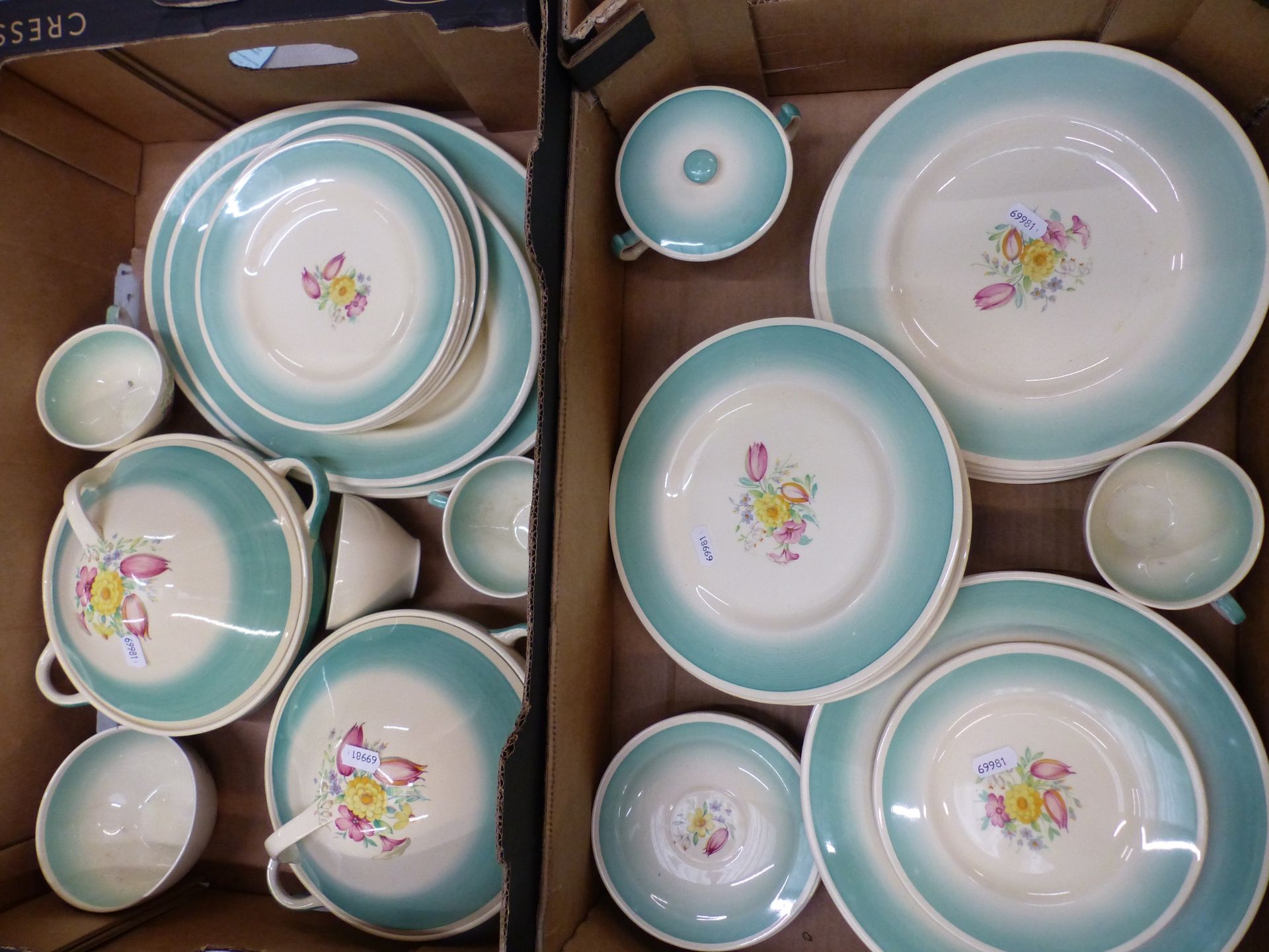 A suite of Susie Cooper Production, Crown Works Burslem tea and dinner ware, two tone with floral
