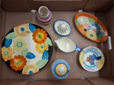 A collection of Gray's Pottery hand-painted Art Deco period ceramics, including a plate, lidded pot,