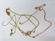 Three scrap 9ct gold necklaces, breaks and tangles noted, combined 8g.