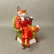 A Royale Stratford anthropomorphic model of a fox, wearing red smoking jacket seated in an
