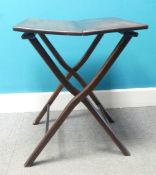 Late 19th/early 20th century wooden folding table, with brass hinges, supported by folding X-frame