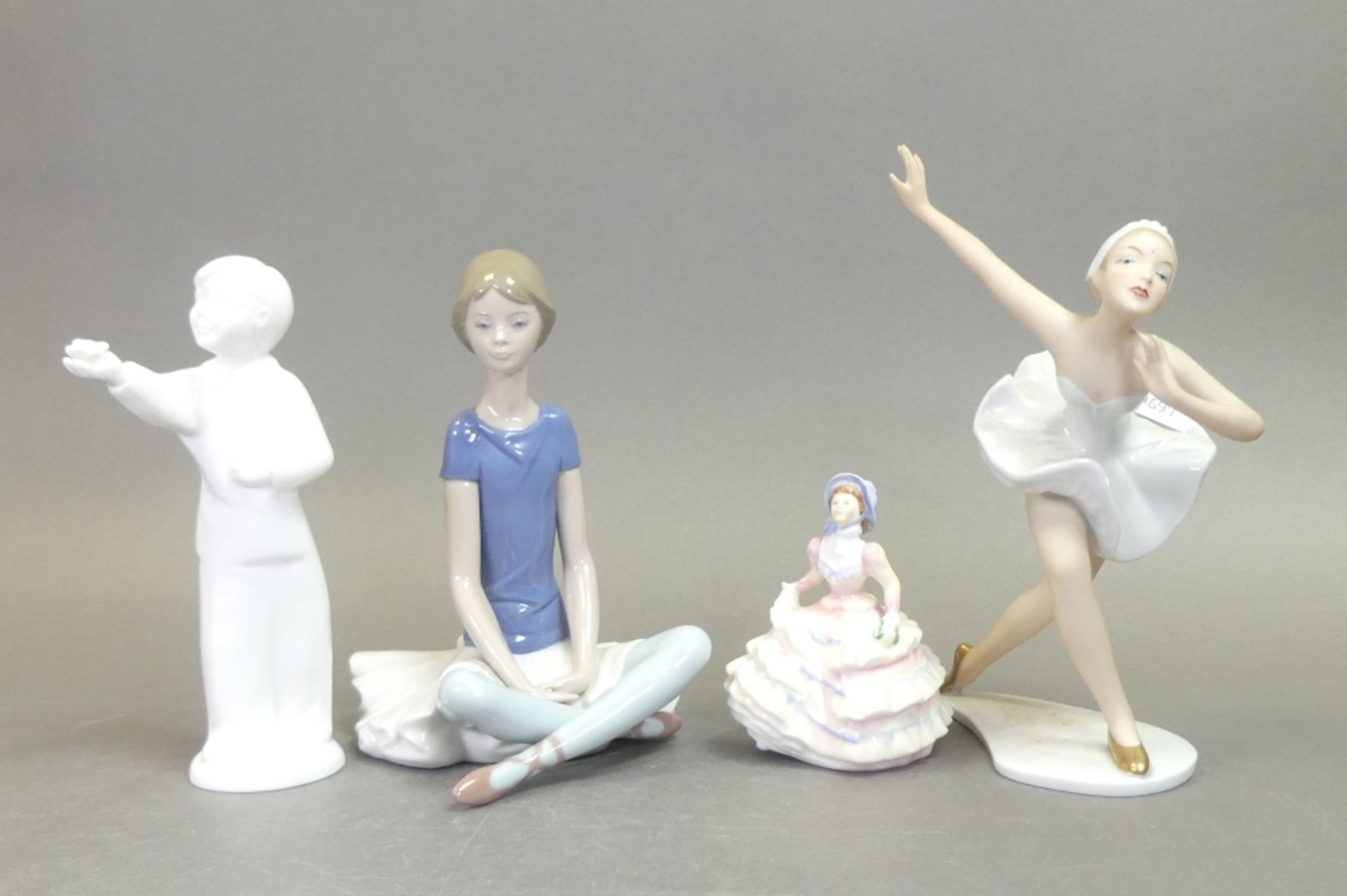 A collection of figurines to include Royal Doulton lady figure Hannah HN3649, Coalport Moments
