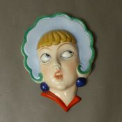 A Czechoslovakian Art Deco face mask, height 21cm.