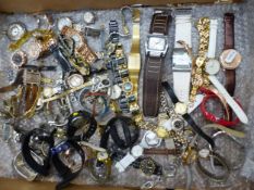 A large collection of ladies and gents wristwatches, brands including Henley and Casio (1 tray).