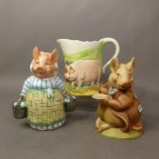 Two Border Fine Arts pig themed money boxes, together with a Border Fine Arts pig themed jug, height