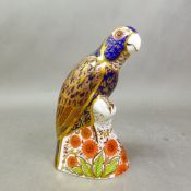 Royal Crown Derby paperweight Bronze Winged Parrot, gold stopper, height 16cm.