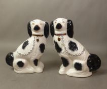 Pair of late Victorian Staffordshire Hearth Dogs, height 22cm (2).