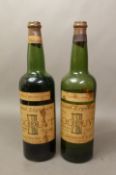 A vintage find - a sealed bottle of LOOPUYT 61.2 proof Creme de Menthe and a sealed bottle of Triple