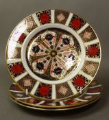 Royal Crown Derby, three Old Imari 1128 pattern salad plates, diameter 22cm (one plate minus