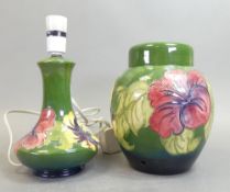 Moorcroft table lamp and table lamp base, both in the Hibiscus pattern on green. (H: 25cm) (2)