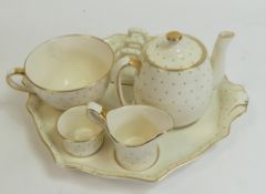 Gray's Pottery 'Tea For One Set' in a green polka dot detail, includes Tray, teapot, cup, sugar bo