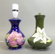 Moorcroft table lamp in the Magnolia pattern on blue ground, together with table lamp base in the