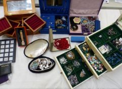 A collection of costume jewellery (silver items noted) and jewellery boxes, together with gem set