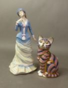 Royal Crown Derby paperweight in the form of a seated cat, together with a Royal Doulton figure