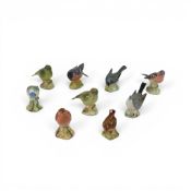 A group of nine Beswick birds to include a Bullfinch model 1042, Grey Wagtail model 1041, Blue Tit