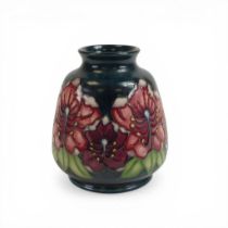 Moorcroft vase decorated in the Hibiscus design, dated 1996, h.15cm