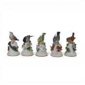 A collection of Franklin Mint porcelain bells, designed by Peter Barrett, to include Black capped