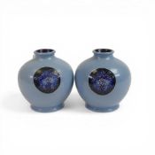 A pair of Moorcroft vases decorated in the Blue flames design, dated 2013, h.12cm. (2)