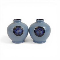 A pair of Moorcroft vases decorated in the Blue flames design, dated 2013, h.12cm. (2)