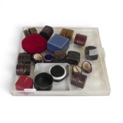 A collection of vintage/antique ring boxes in plastic case.