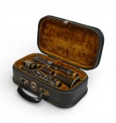 Vintage Clarinet with a Henri Selmer Paris mouth piece in original case.
