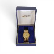 Seiko Gentleman's gold plated dress date wristwatch and bracelet, boxed.