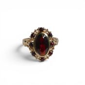 Yellow & metal flame dress ring set with dark red stones, electronically tested to be 9ct gold, size